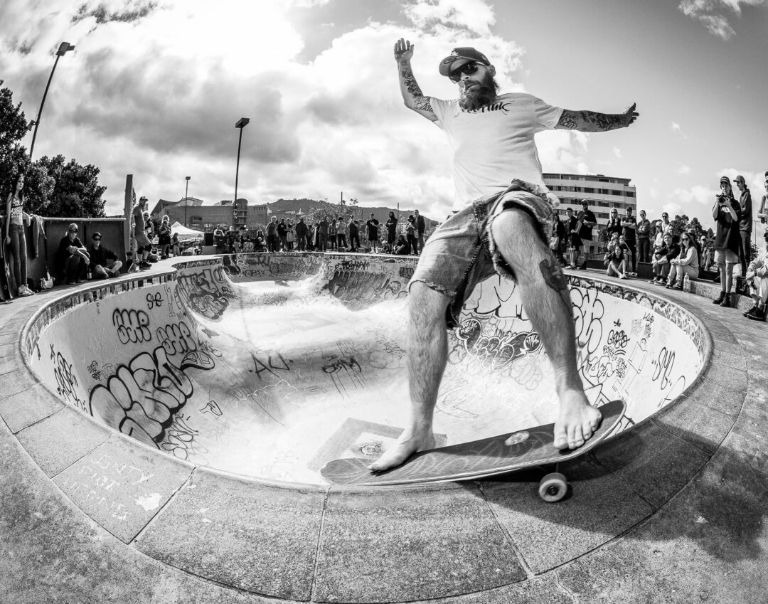 Kadin Elliott, barefoot fronside Smith grind.