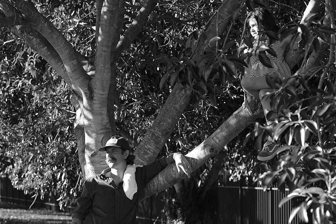 Nigel Cameron and daughter Airlia watching the action from the trees